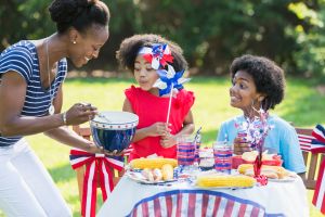 Mother and children celebrating 4th of July
