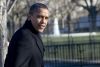 US President Barack Obama walks back to