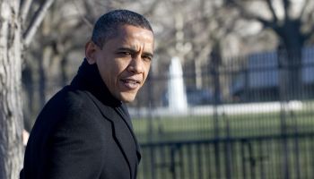 US President Barack Obama walks back to