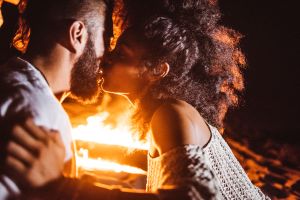 Couple kissing at the beach