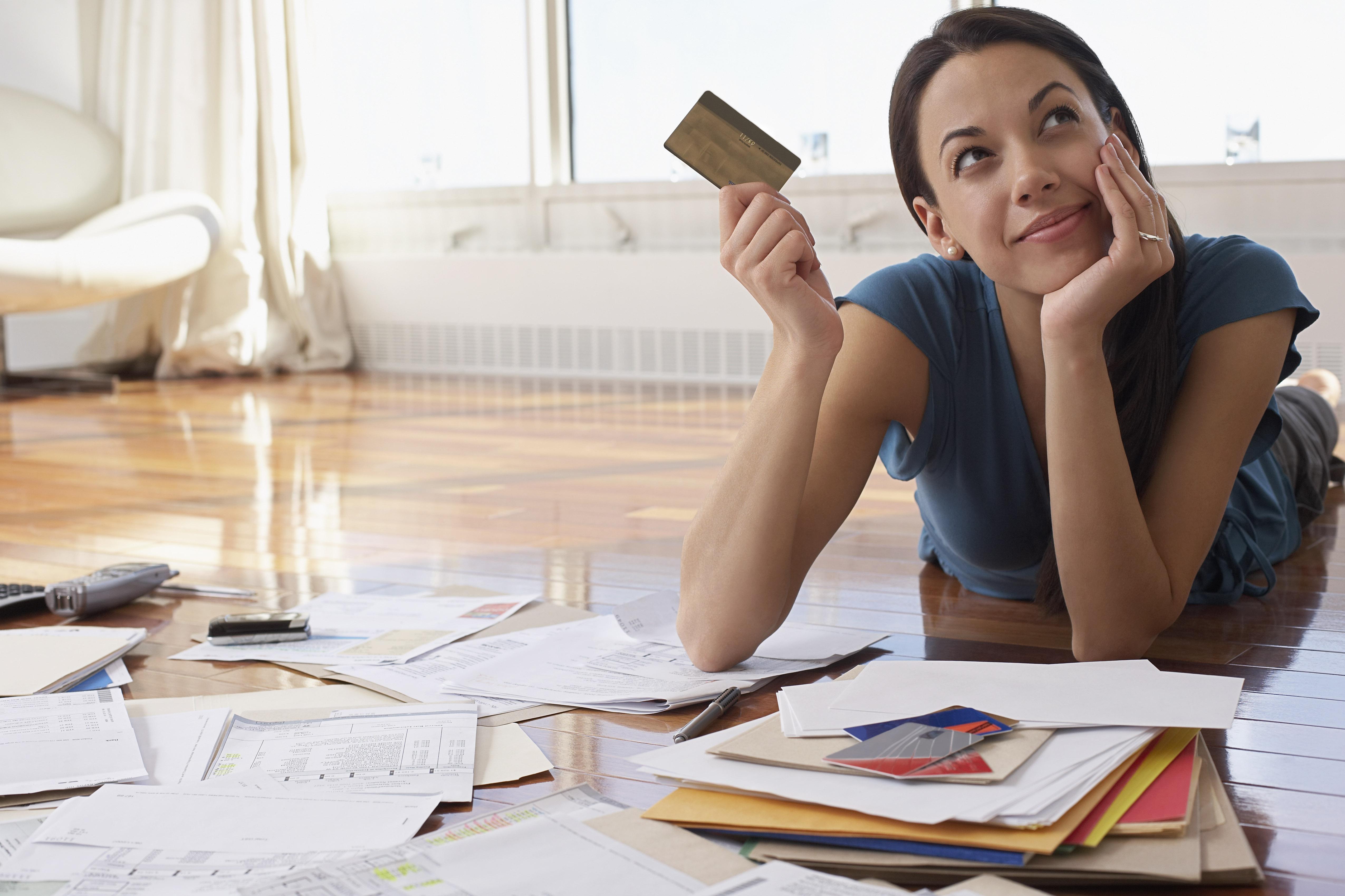 Woman Holding Credit Card