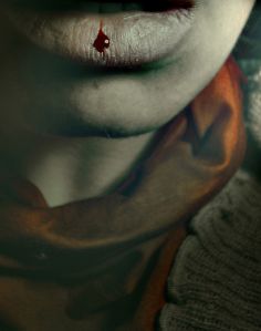 Close-up of a womans lips bleeding