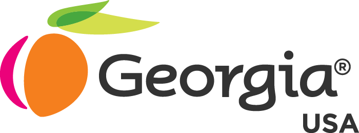 Georgia logo with orange fruit and green leaves on a green background.